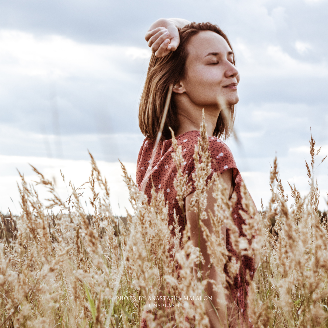 A woman in a wheat field